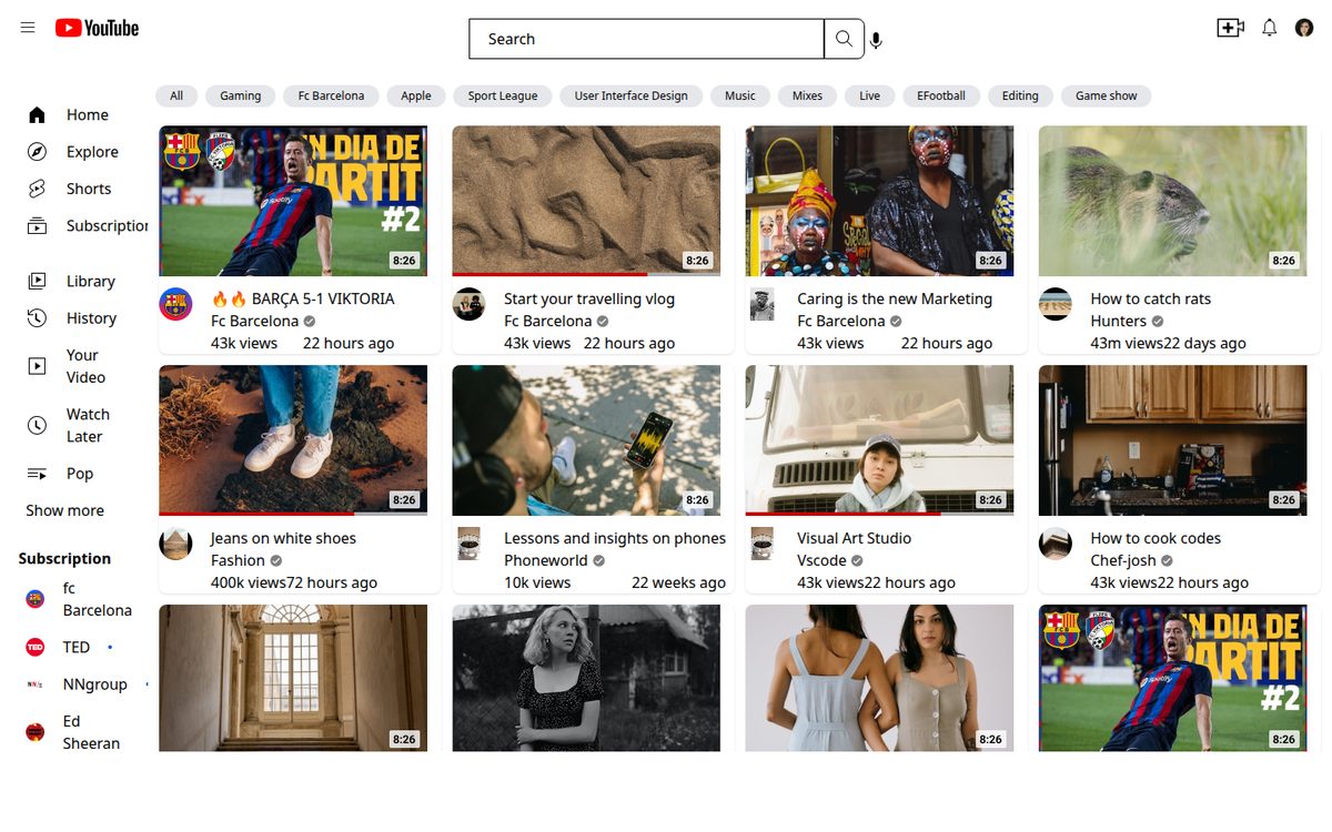 YouTube home page clone with sidebar and video grid